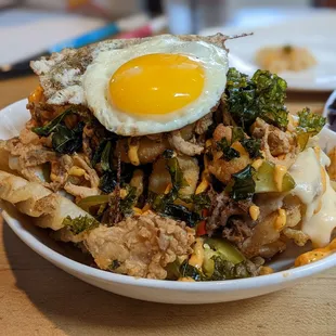 Obscene Poutine with egg