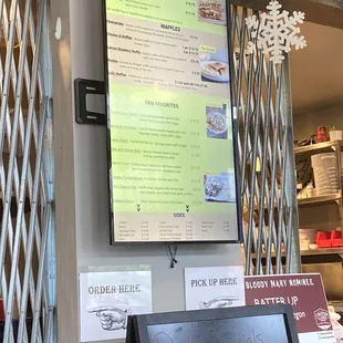 a menu displayed on the wall