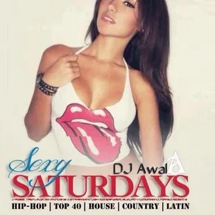 a woman in a white tank top with the rolling stones on it