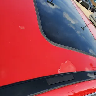 Other side top of car- was told &quot;NO DAMAGES, NO SCRATCHES...CAR WAS IN IMPECCABLE CONDITION &quot;