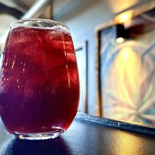 a red drink in a glass