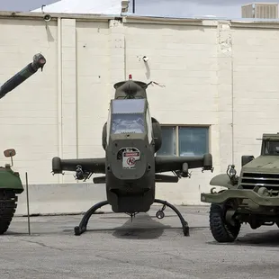 military vehicles and a helicopter