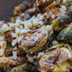 Brussels - flash fried tossed with sea salt, garlic, lemon, and gorgonzola cheese