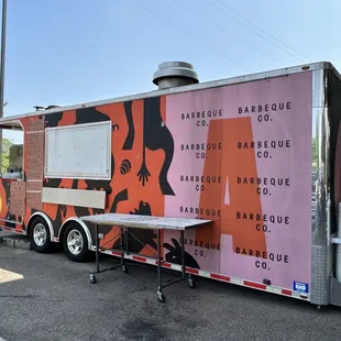 a food truck parked in a parking lot