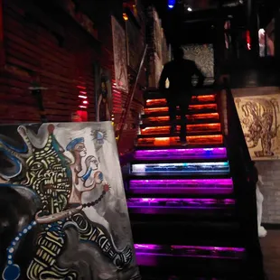 a man walking up a flight of stairs