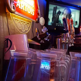 a bar with a neon sign
