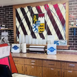 Behind the counter stained glass artwork