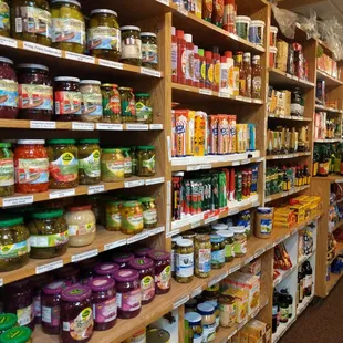 Rows and rows of condiments, jams, and snacks