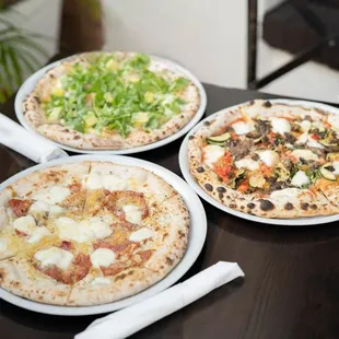 three different pizzas