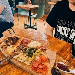 a man sitting at a table in a restaurant