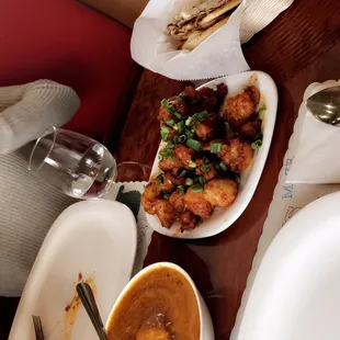 Our spread! Butter chicken, gobi, and Mysore Dosas