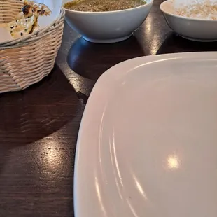 Portions: 4 Naans, Family size Bowl Saag Paneer, Rice on right