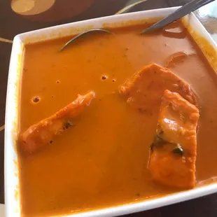 Watered down butter chicken.  like a soup, not authentic