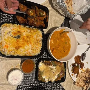 Chicken dumplings Biryani Rice,  Chicken korma Apollo fish  Samosa chaat Garlic Naan