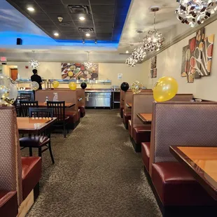 a restaurant with booths and tables