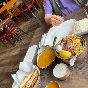 a woman sitting at a table