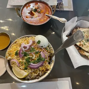 Goat rice, butter chicken and garlic naan