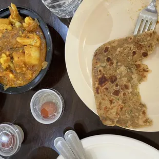 Aloo Gobi on the left and naan