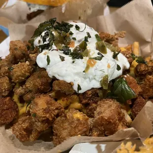Loaded Bawk Fries - think fries with popcorn chicken and nacho sauce!!!! So goood
