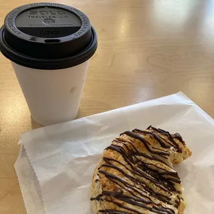 Latte and puff pastry with almond and dark chocolate