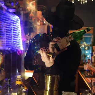 a man in a witch costume