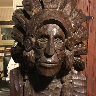 A cigar store Indian.