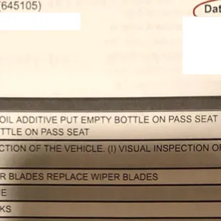 (Picture 1/3) Shows that Baxter recommended new power steering line and spark plugs in May 2022.