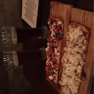 Sweet Hawaiian and bruschetta de Napoli flatbread paid with Great Lakes Christmas ale and 12 dogs of Christmas