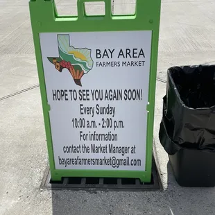 a sign for the farmers market