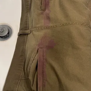 Stained pants from paint. Fresh out of the washing machine.
