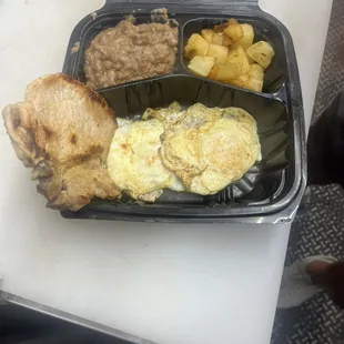 Pork chop plate with any style eggs with beans and potatoes w/ 2 home tortillas