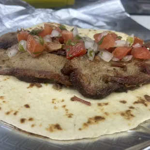Brisket taco with pico de gallo
