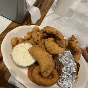 a plate of fried fish and onion rings