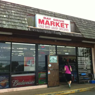 a woman entering the store