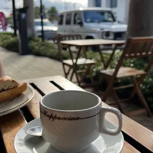 a cup of coffee on a table