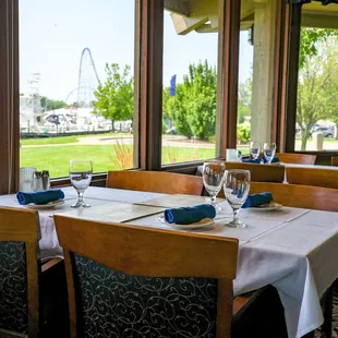 a dining room with a view of the water