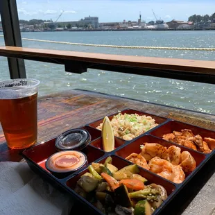 Salmon &amp; shrimp plate with an Anchor Steam.