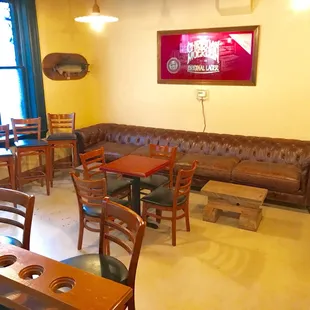 Back room. Reservable as long as the group is drinking.