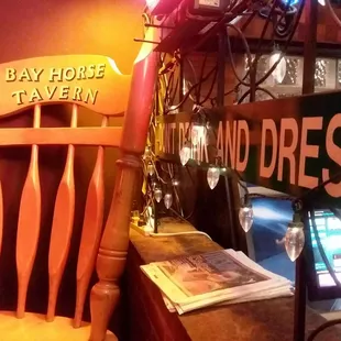 a chair and a sign