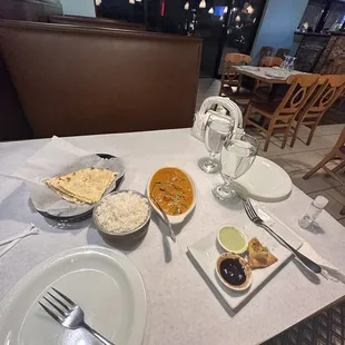 Butter Chicken CL33. Garlic Naan CL01. Vegetarian Samosa