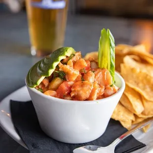 Local white fish ceviche! served with avocado and tortilla chips. This is a must try!!