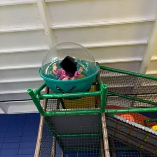 Kid playing in ninja course