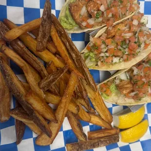 Fried shrimp taco with pico de gallo and guacamole served with our hand cut homemade fries