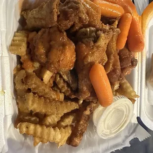 a meal in a styrofoam container