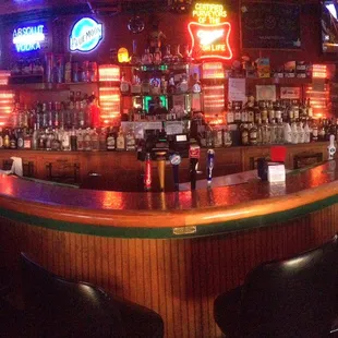 a bar with neon signs