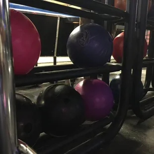 a rack of bowling balls