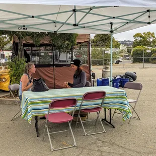 Covered seating for those who wish to nosh at the market!