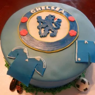 My friend's birthday cake. Obviously a Chelsea fan, with replica of his soccer shoes at the base