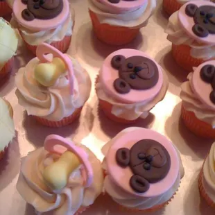 Matching baby shower cupcakes (I didn't get a photo of the stand, but the round cake was on top with 2 layers of cupcakes below)