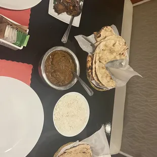 Goat Curry, Naan, Goat Pepper Fry Idly (Two Pieces) and Medhu Vada (One Piece)